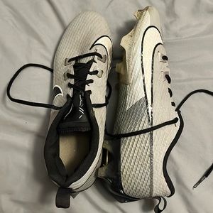 Grey/black/white Nike football cleats